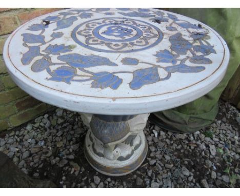 A ceramic elephant style garden table 