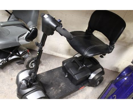A mobility scooter with key - untested 