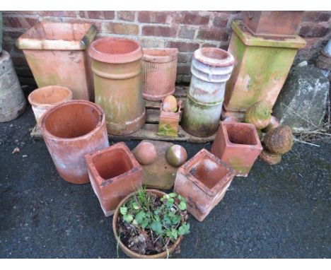 A large selection of terracotta garden ornaments to include planters, chimney pots etc (21)