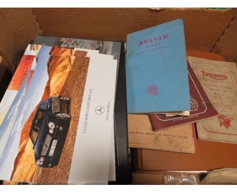 A tray of vintage and modern motor vehicle instruction manuals and guides to include a small vintage Smiths oil pressure gaug