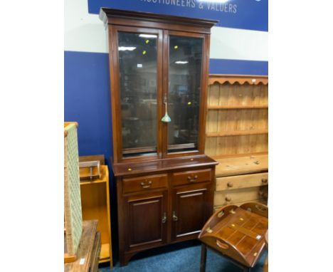 A vintage mahogany glazed bookcase H 221 cm W 99 cm 