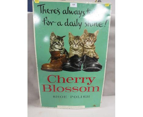 A vintage print on metal, advertising sign for Cherry Blossom shoe polish