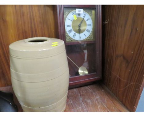 One clock and a ceramic barrel