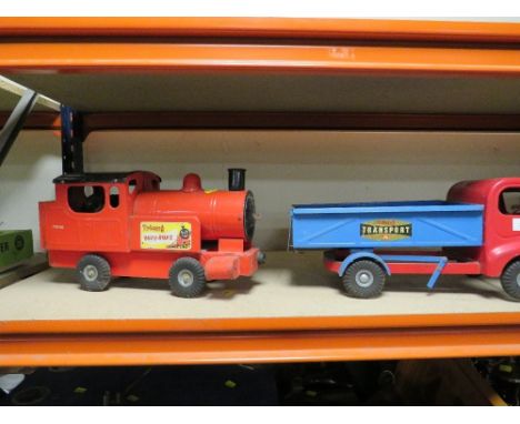 A vintage Tri-ang transport tipper truck together with a Tri-ang huff puff loco-motive 