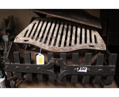 A decorative fire grate etc 