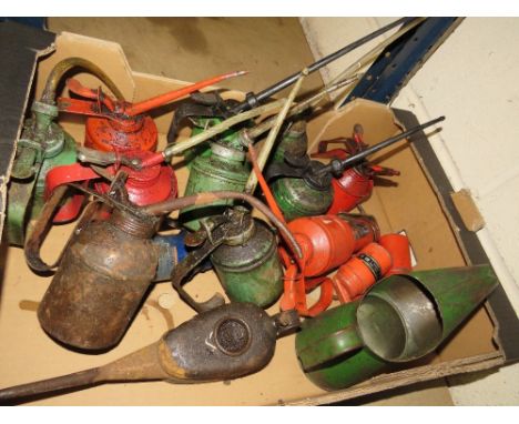 Seventeen vintage metal oil cans to include Wesco etc 