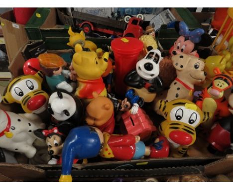 A tray of vintage novelty money boxes and bubble bath figures to include Mickey Mouse etc. 