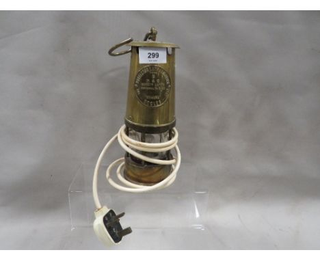 A miners lamp converted into working electric light 