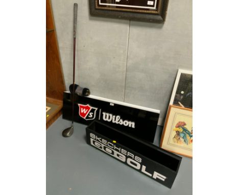 Two point of sale / advertising golf signs, comprising Wilson Staff golf sign and a Skechers golf sign together with a Titlei