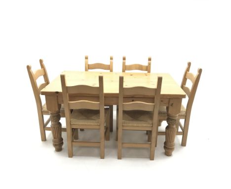 Solid pine table, turned tapering reeded supports (W153cm, H79cm, D91cm) and set five beech ladder back dining chairs, rush s