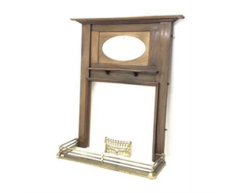 Early 20th century mahogany fire surround, projecting cornice, oval bevel edge mirror (W153cm, H179cm, D15cm) with brass hear