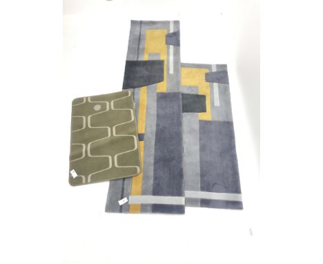 Modern blue ground rug with geometrical patterned field (150cm x 82cm) a matching runner rug (227cm x 62cm) and another rug -