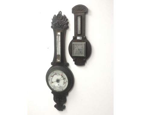 Early 20th century oak cased aneroid barometer with thermometer and another early 20th century oak cased barometer with carve