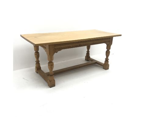 Light oak refectory style dining table, baluster supports joined by floor stretchers, W184cm, H77cm, D81cm - Condition Report