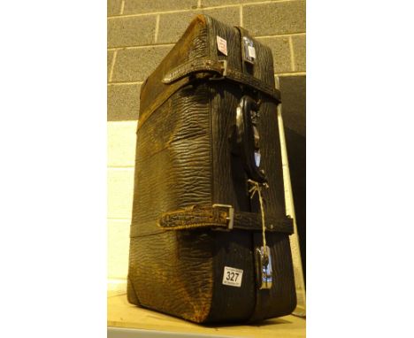 Vintage leather suitcase with key
