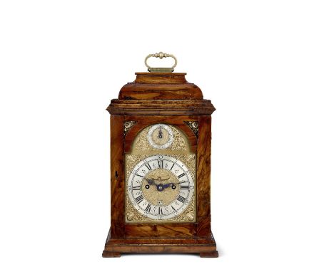 A mid 18th century table clock in a re-vennered olivewood caseAsselin, LondonThe inverted caddy top case veneered in olivewoo