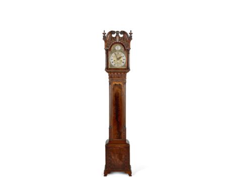 A late 19th/early 20th century mahogany miniature weight driven longcase clockThe hood with broken swan neck pediment over fr