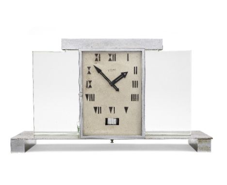 A second quarter of the 20th century chrome and glass Art Deco style Atmos timepieceAtmos, J. L. Reutter, France.  Numbered o