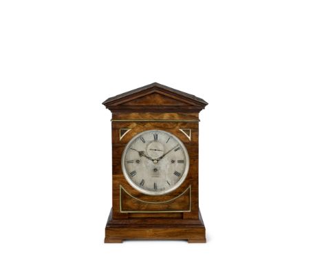 An impressive mid 19th century brass-banded rosewood quarter chiming table clock with deadbeat escapement and running seconds