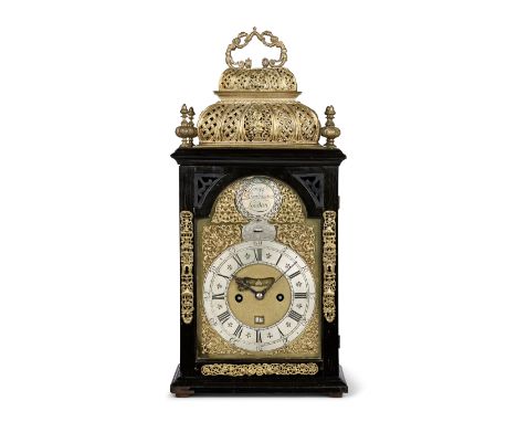 An early 18th century ebony veneered double basket table clockJames Blackborow, LondonSurmounted by a fancy handle over a ste
