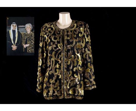 Baroness Boothroyd A much loved and worn sequin gold and black, evening jacket, with accompanying photograph of her ladyship 