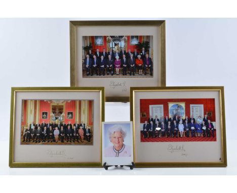 Members of the Order of Merit, three signed photographs of the Members attending the Order of Merit Lunch held by Queen Eliza