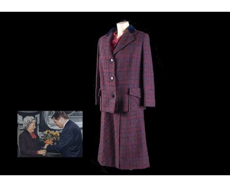 A Lachasse London woollen tweed style, velvet collared business suit, with associated cerise blouse. With accompanying photog