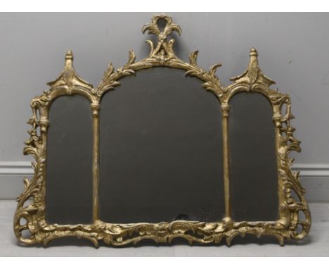 A small gilt metal overmantel mirror in the Chinese Chippendale style. H.70 W.80cm. 