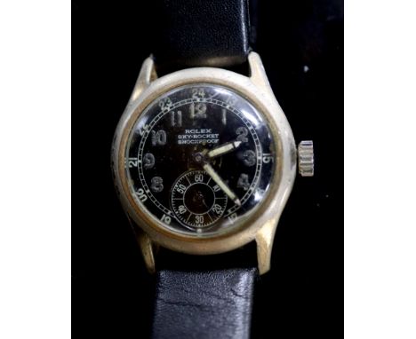 A 1940's/1950's? stainless steel boy's size Rolex Sky Rocket manual wind wrist watch, on later associated strap, the black Ar