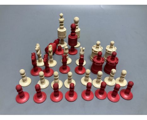 A late 19th century stained natural bone chess set