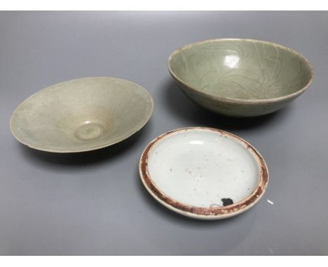 A Chinese Longquan celadon bowl, Song dynasty, 16cm, a conical celadon dish and a seal paste box base