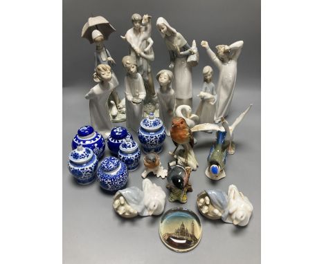 A collection of Lladro and Goebel porcelain figures and other items