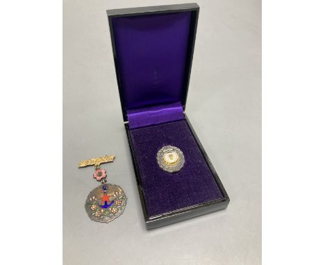 Two Japanese historic medals possibly silver and enamel