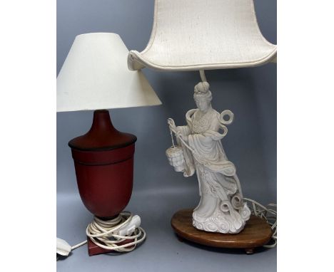 A Chinese blanc de chine porcelain table lamp, modelled as Guanyin, 65cm high including shade and a toleware vase shaped tabl