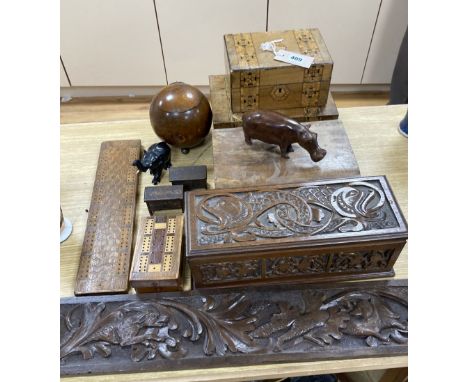 Three inlaid wooden boxes, a carved oak box, two cribbage boards and sundry treen, 19th/20th century