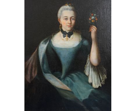 18th century French Schooloil on canvas laid on boardPortrait of a lady holding a bouquet of flowers32.5 x 25.25in.CONDITION: