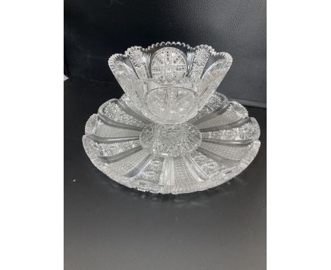 An American or Bohemian brilliant cut glass pedestal bowl and large dish, late 19th century, dish 36cmCONDITION: Andrew Rudeb