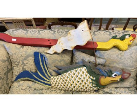 A Balinese carved painted wood and metal weather vane, length 138cm together with a painted Balinese rail