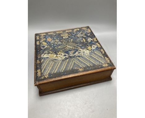 A Chinese circular silk roundel, 44cm and a Chinese kesi rank badge later attached to a box and a machine tapestry
