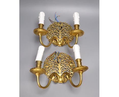 A pair of gilt brass twin-light wall sconces, height 22cm