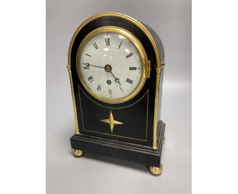An early 19th century Desbois and Wheeler mahogany mantel timepiece, ebonised case with brass mounts, 9.5cm convex enamel dia