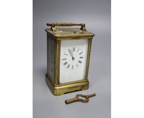 An hour repeating brass carriage clock,14cm