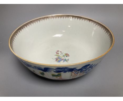 A Chinese famille rose punch bowl, Qianlong period, enamel painted in underglaze blue with famille rose enamels, figures in p