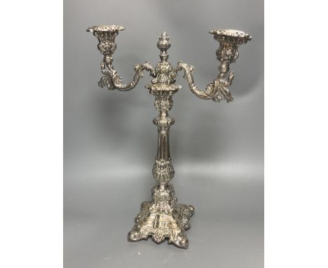 A silver plated twin light candelabrum, rococo style, hollow construction, 41cm high