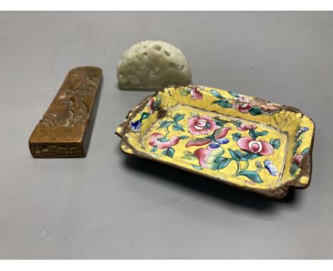A Chinese enamel dish, a semi-circular carved hardstone panel and a carved metal panel