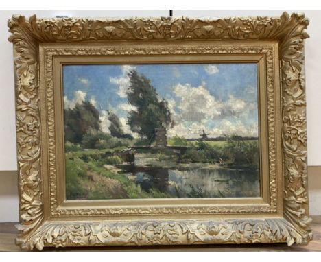 Chris van der Windt (Belgian 1877-1952), Dutch river landscape with a plank bridge and a distant windmill, signed C dv Windt 