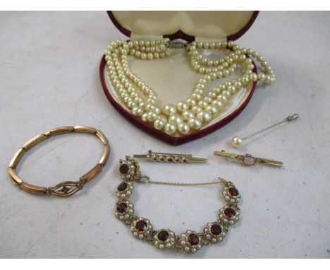 Jewellery to include a bracelet with a 9ct gold clasp, stick pins, a faux pearl necklace and a bracelet Location: 