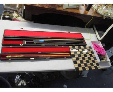 Two Riley snooker/pool cues in carry case together with an alabaster and slate chess set 