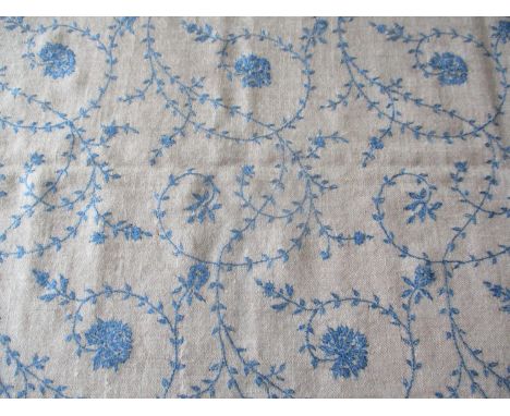 A North Indian/Cashmir light weight cashmere stole having an oatmeal coloured ground adorned with hand embroidered cornflower