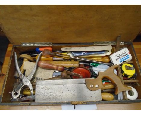 A small wooden tool box containing a selection of tools 
